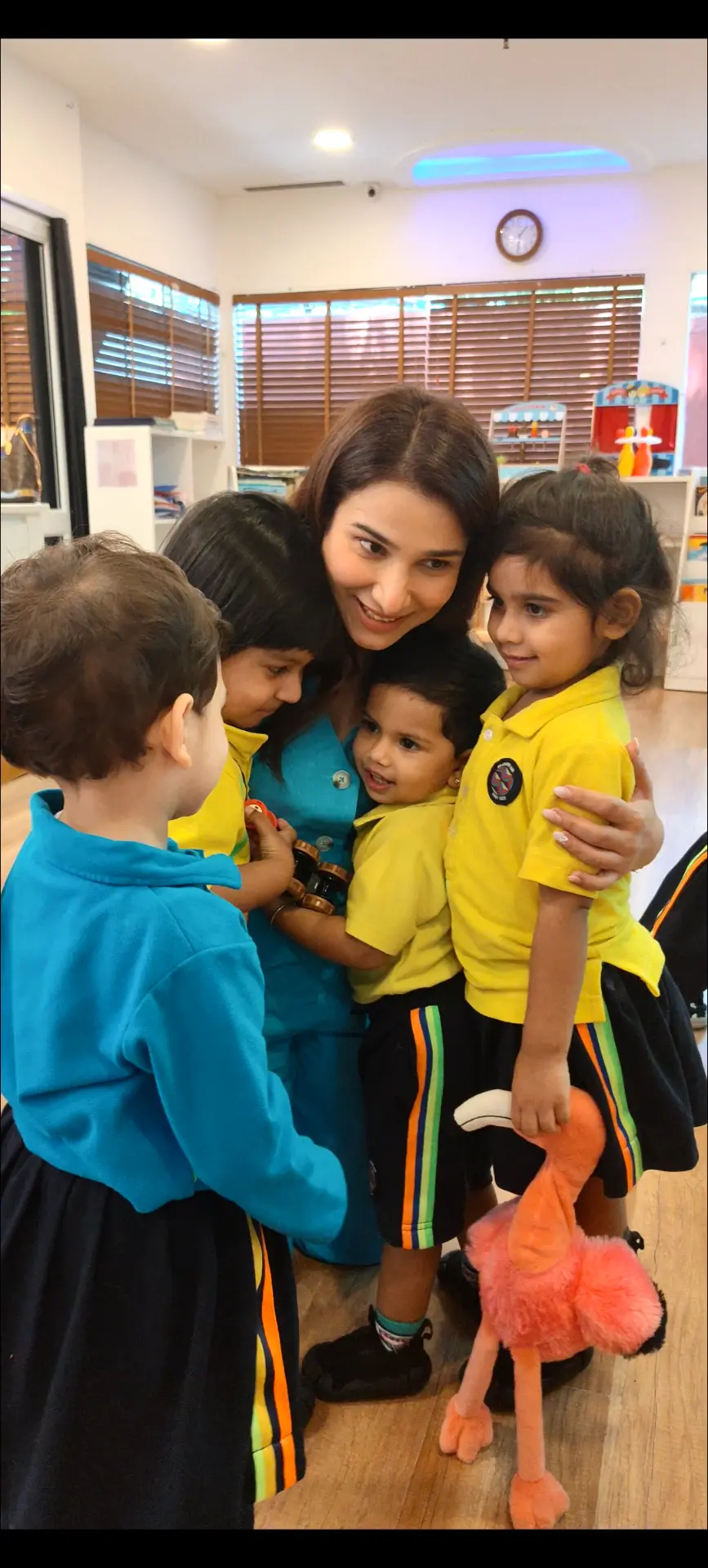 Educator with young children in a classroom